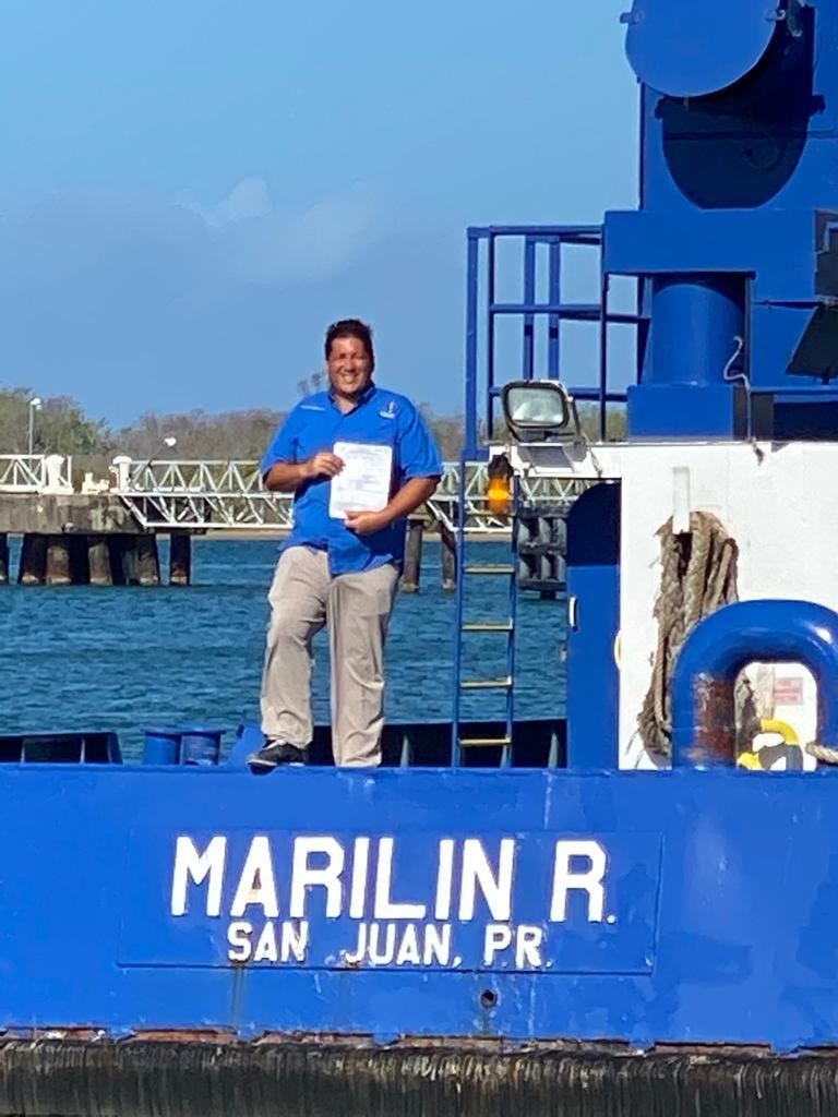 Pedro with the COI for the Marilin R., the first vessel to earn its COI through the USCG option